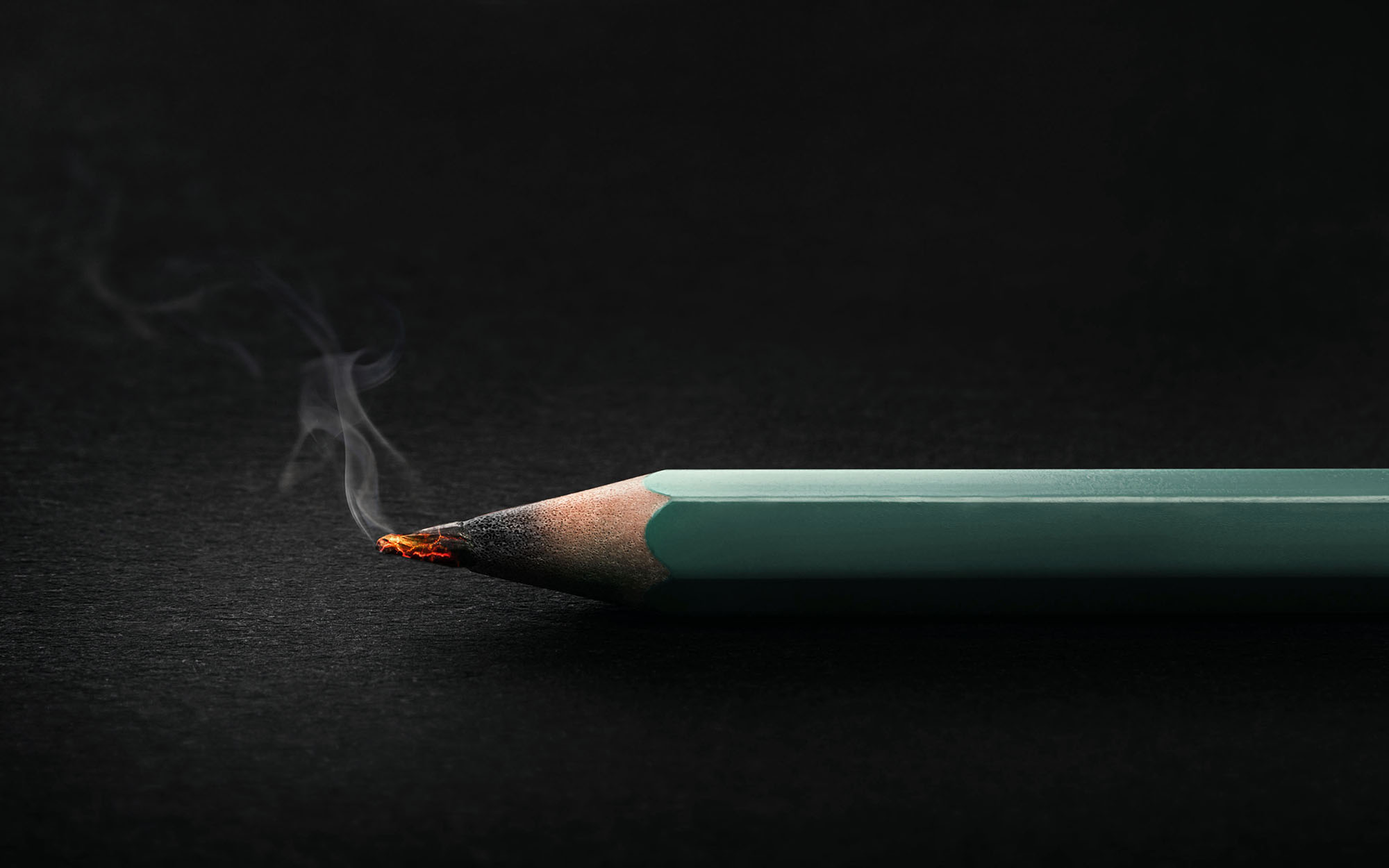 a burning pencil tip